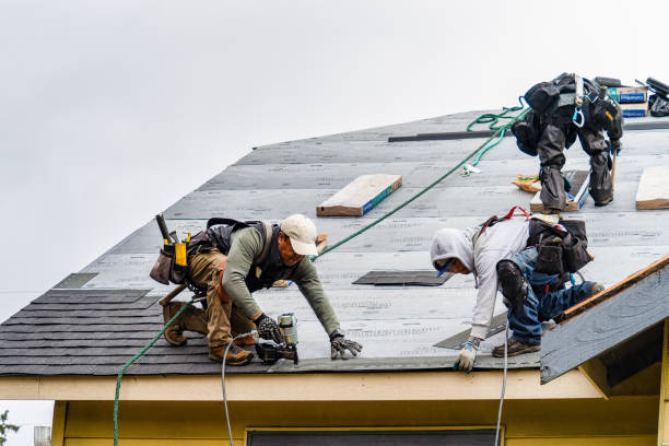 Professional Roofing technician working in Cambridge, MA